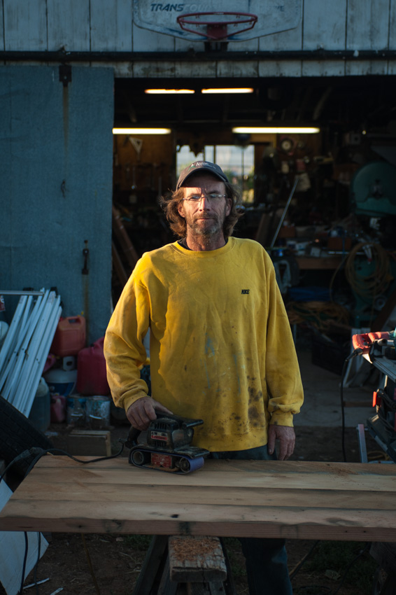 Johnny, a temporary worker, outside of the shop at Zephyros farm in Paonia, CO.