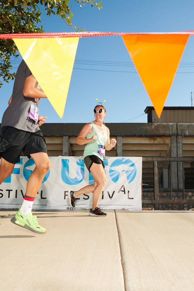 Race runners in alien attire