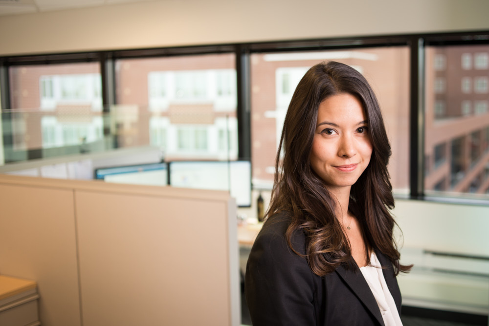 A busineswoman poses for a portrait in her office