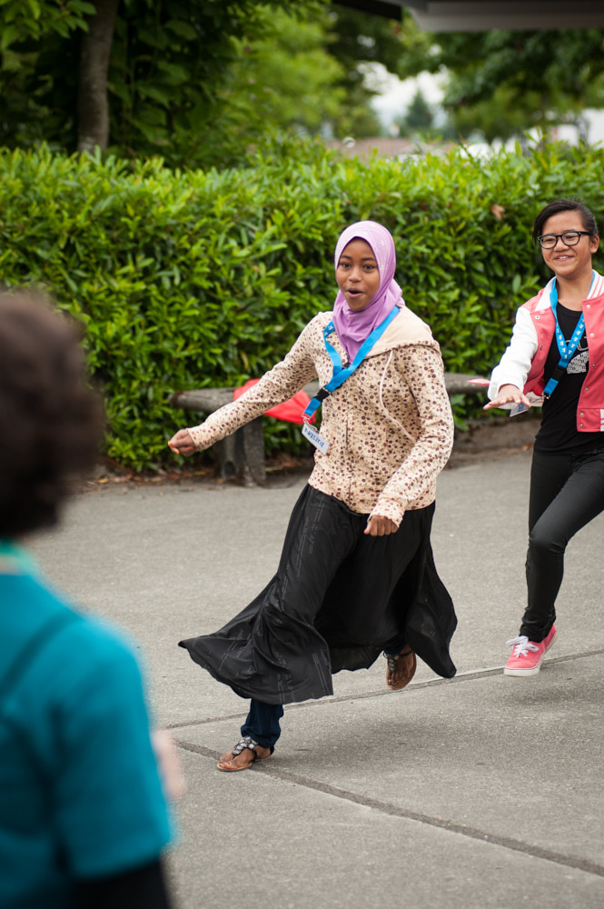 Campers run and play tag outside