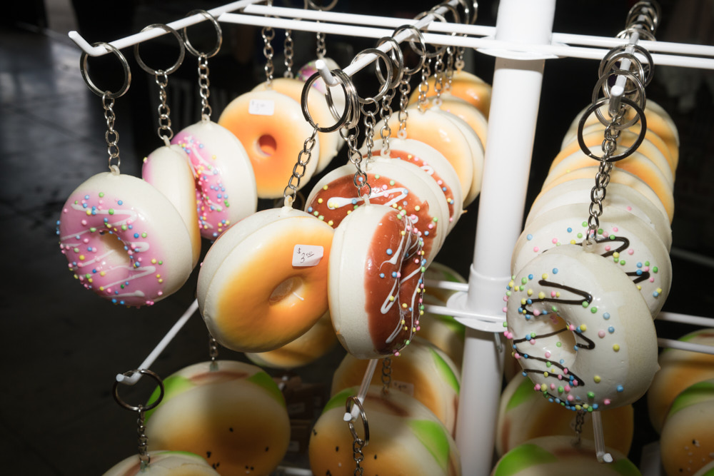 Donut keychains on a display stand