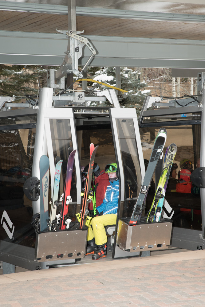 A man on a gondola lift