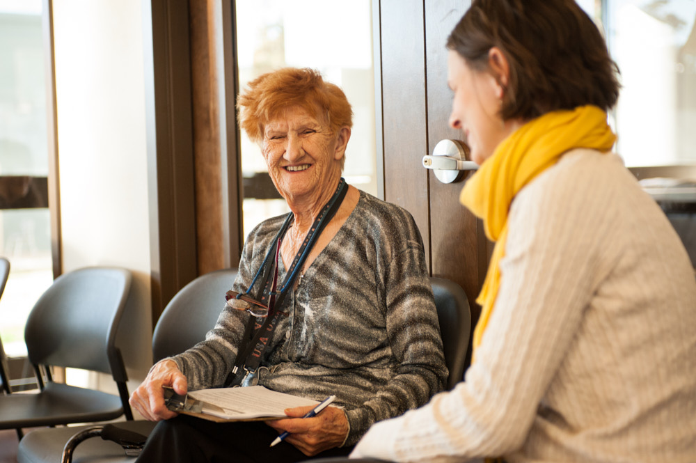 A patient smiling at a clinic