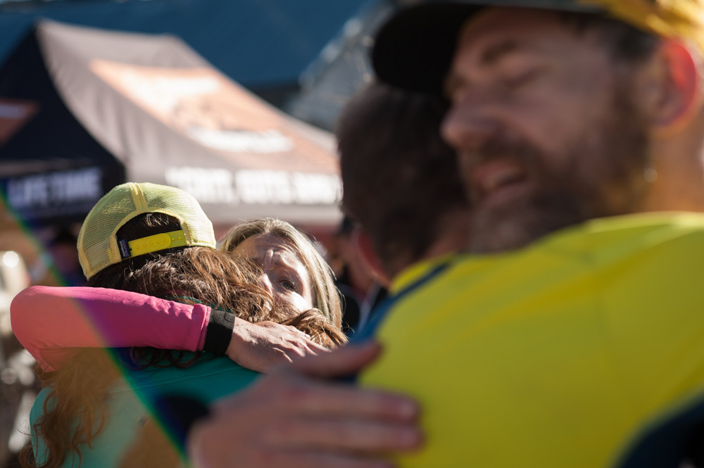 Racers embrace after finishing the Leadville 100