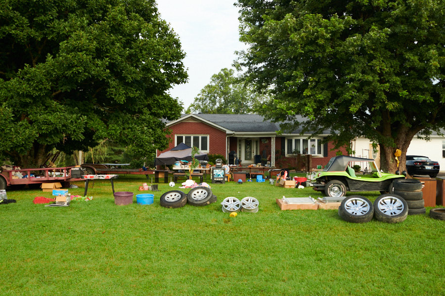 Tires and other goods for sale in a yard