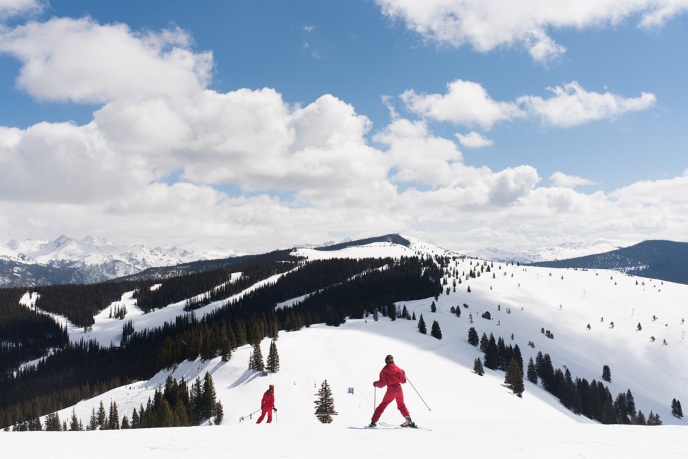 Two skiers atop Vail Resort