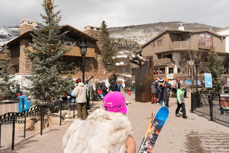 Skiers at the base of Vail Village