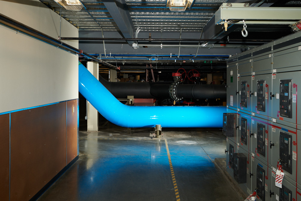 Large pipes for water cooling inside the Cheyenne supercomputer