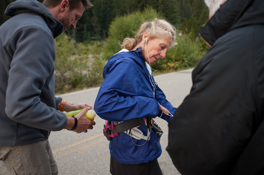 A female runner restocks supplies