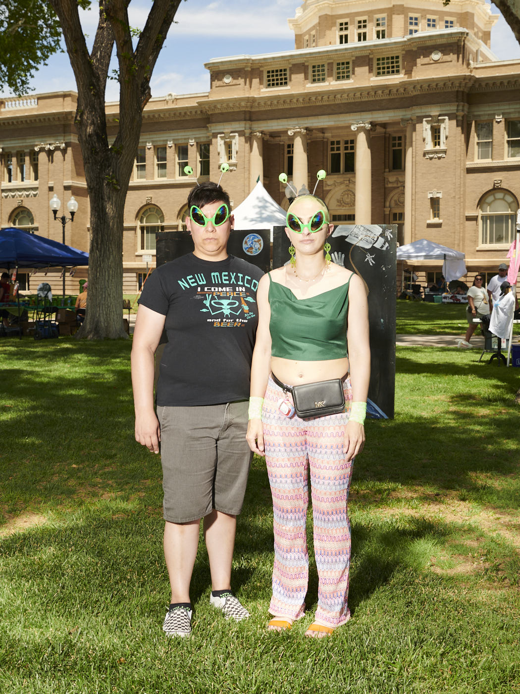 A couple wearing alien glasses at the Roswell UFO Festival