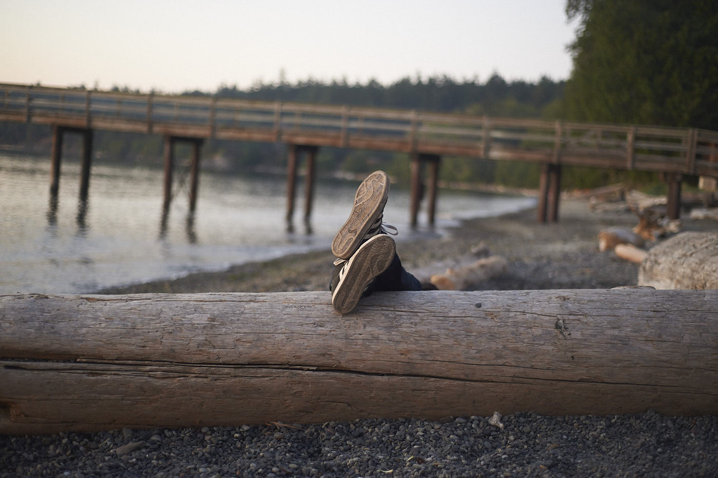 Feet up on a beach on Orcas Island in the San Juan Islands in Washington.