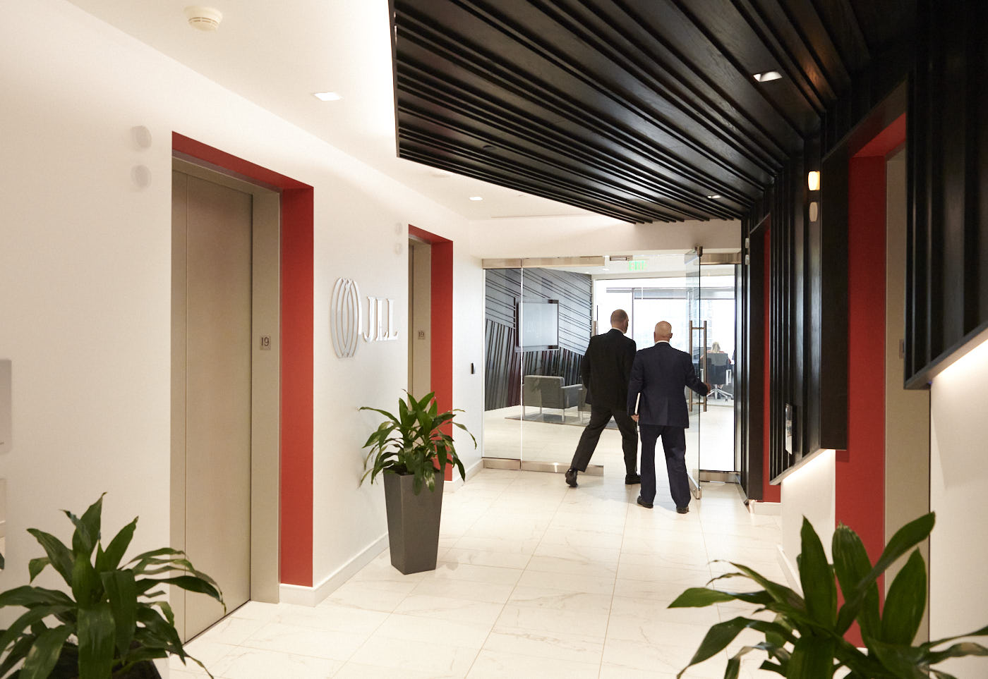 06-denver-businessmen-entering-door