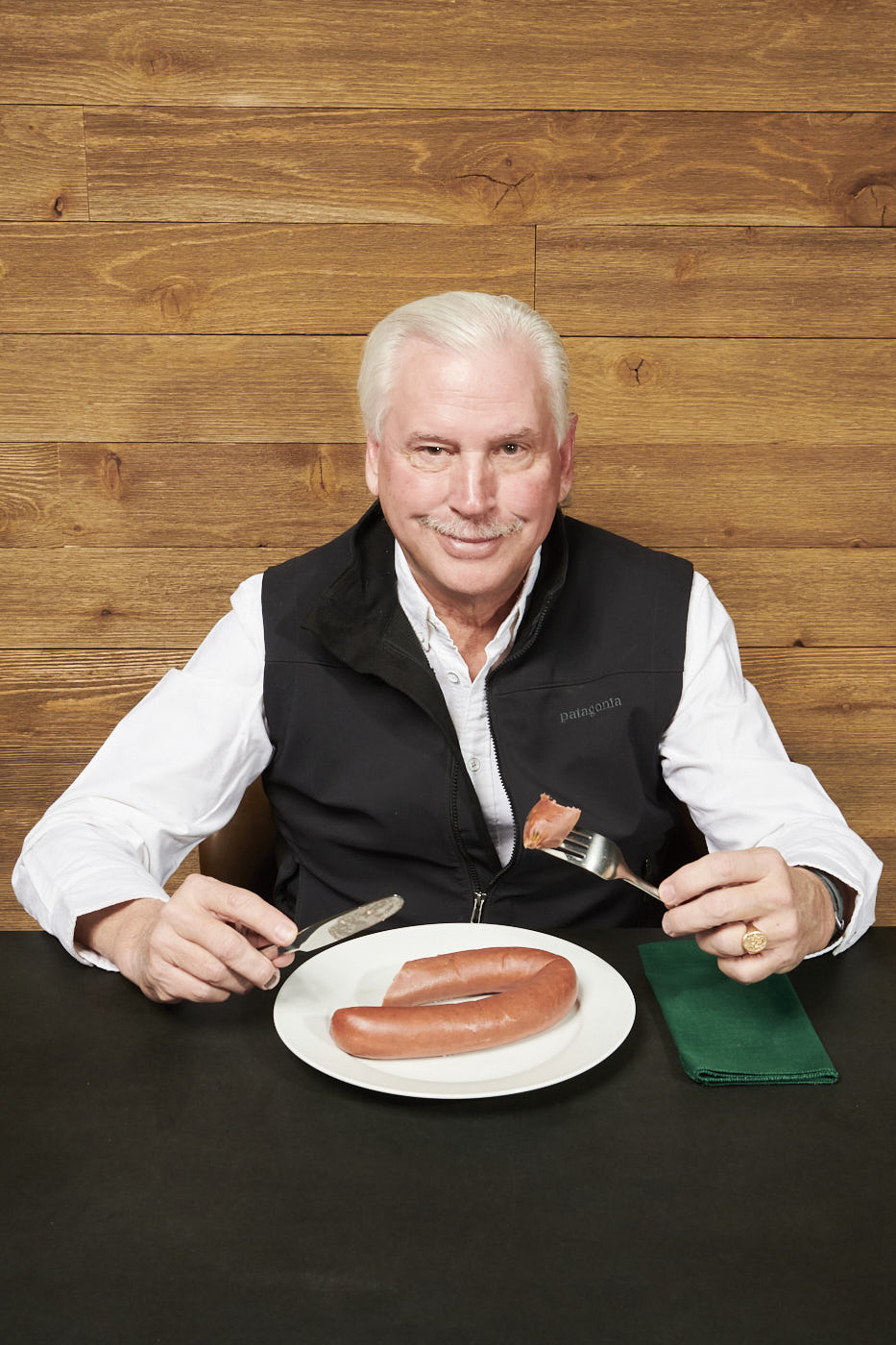 08-man-eating-sausage-portrait